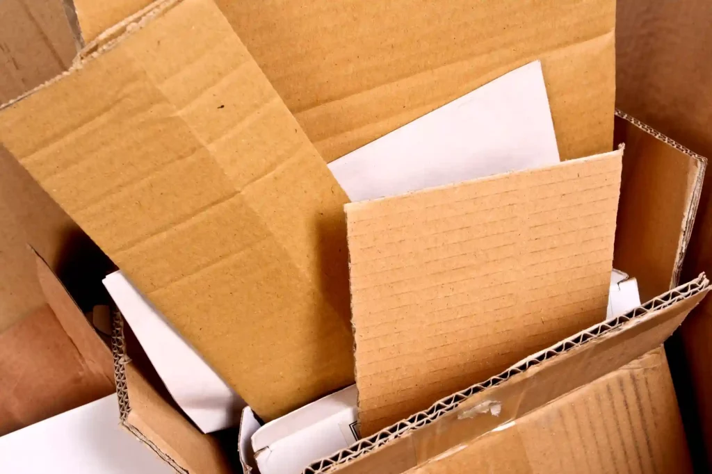 cardboard boxes stacked up inside a cardboard box
